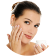 Female applying lotion to cheek